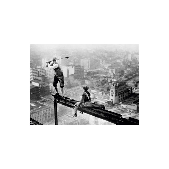 GOLFER TEEING OFF ON GIRDER HIGH ABOVE CITY, 1927