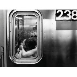 KISSING IN A SUBWAY CAR