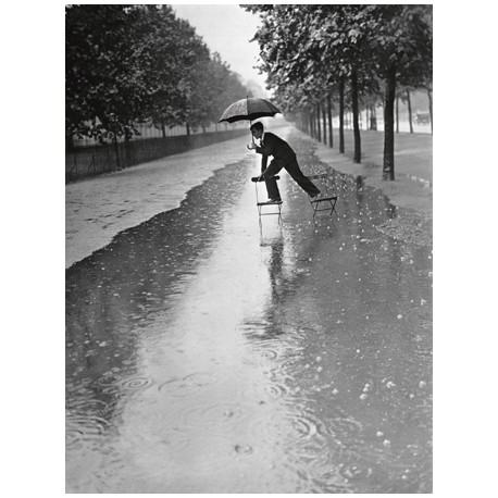 MAN CROSSING PUDDLE ON CHAIRS, 1934