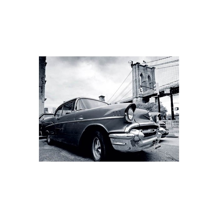 VINTAGE CAR PARKED BY CITY BRIDGE
