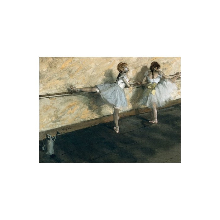 DANCERS PRACTICING AT THE BARRE