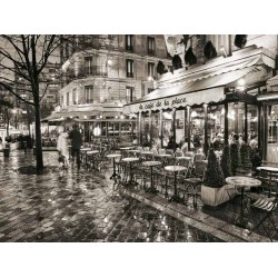 SIDEWALK CAFE ON RAINY EVENING IN PARIS