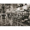 SIDEWALK CAFE ON RAINY EVENING IN PARIS