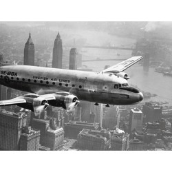 AIRCRAFT FLYING OVER CITY, 1946