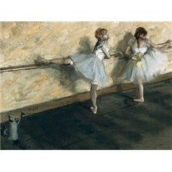 DANCERS PRACTICING AT THE BARRE