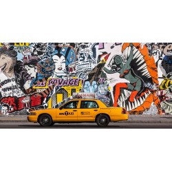 Taxi and mural painting in Soho, NYC