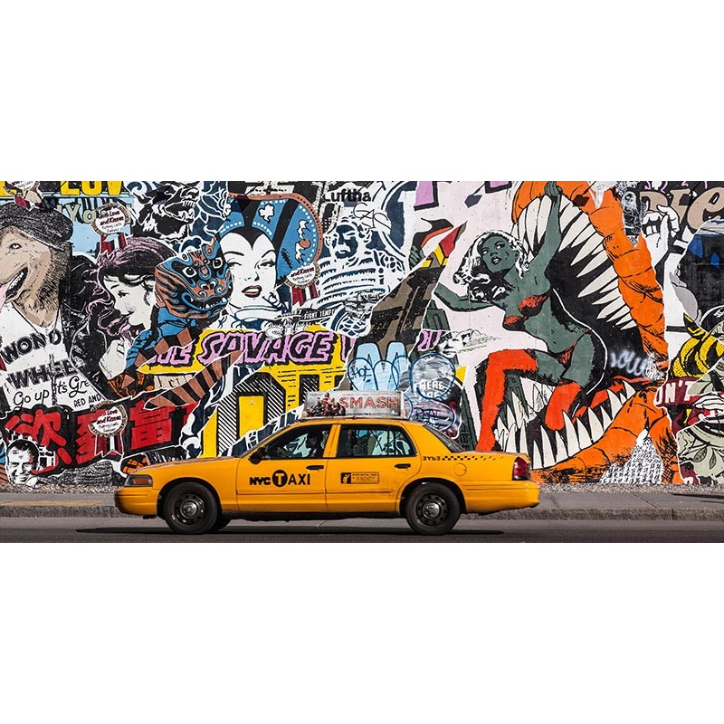 Taxi and mural painting in Soho, NYC